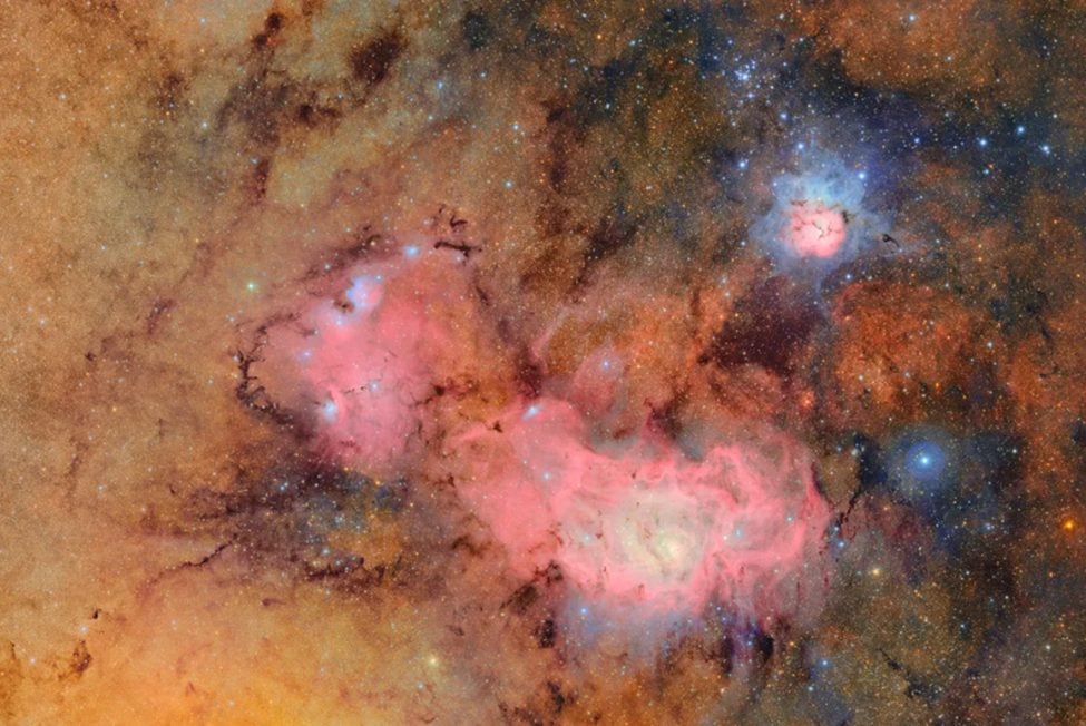 This image of the the Trifid nebula (top) and the Lagoon nebula (bottom) was put together from 678 separate images taken over seven hours of observations. NSF–DOE Vera C. Rubin Observatory